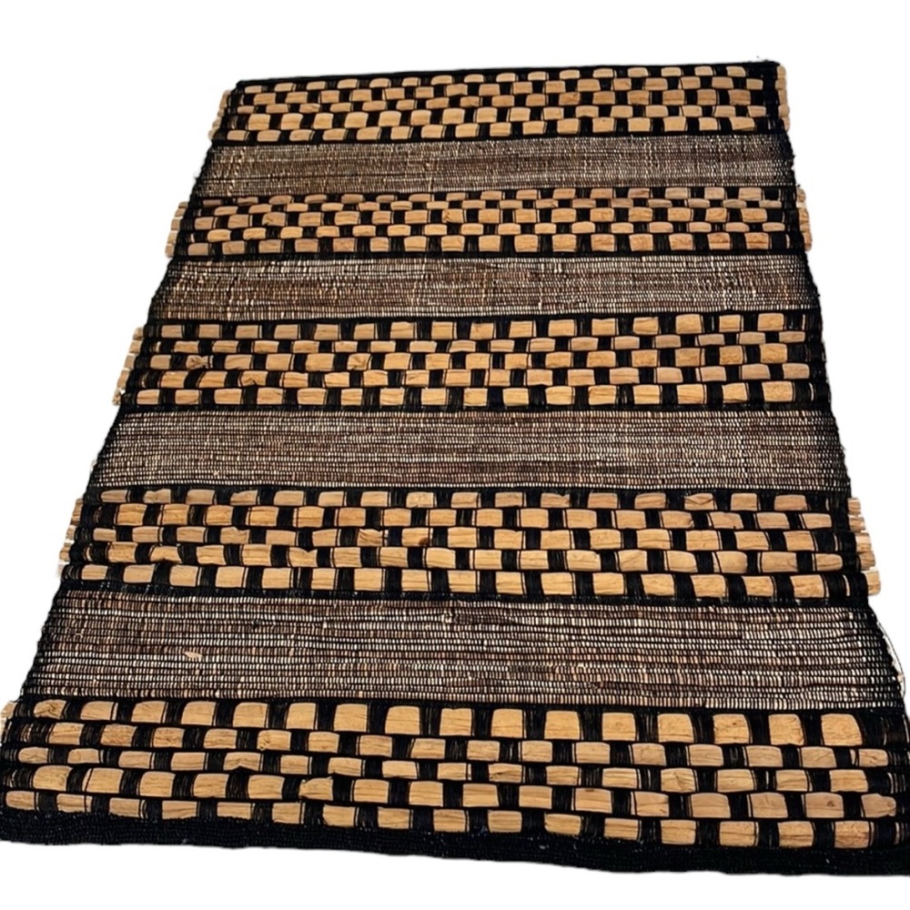 Set of 4 raffia woven placements in black and brown. Gently used.